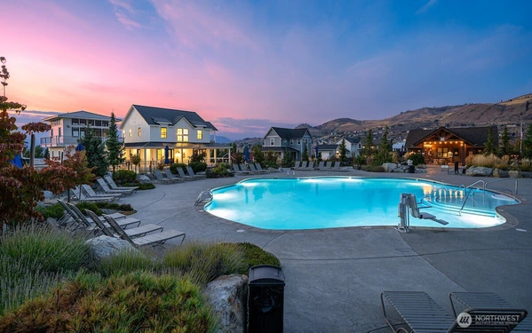 The upper pool, coffee shop, hot tub, firepit & playfield.  Also, includes outdoor BBQ’s, outdoor wood burning firepit, and pickle ball!