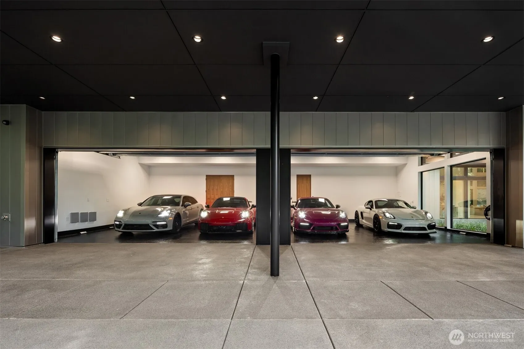 The 4 car garage and expansive carport and motor court.