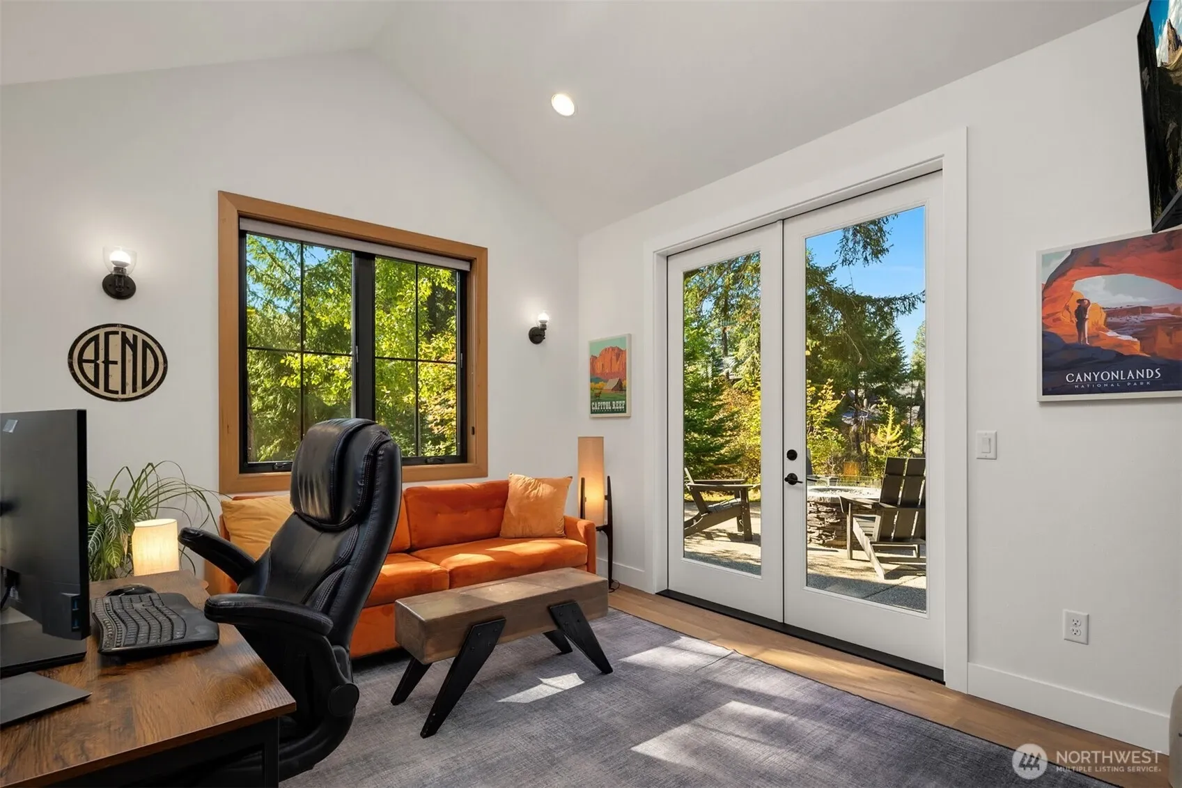 Main level bedroom with fireplace (or office).